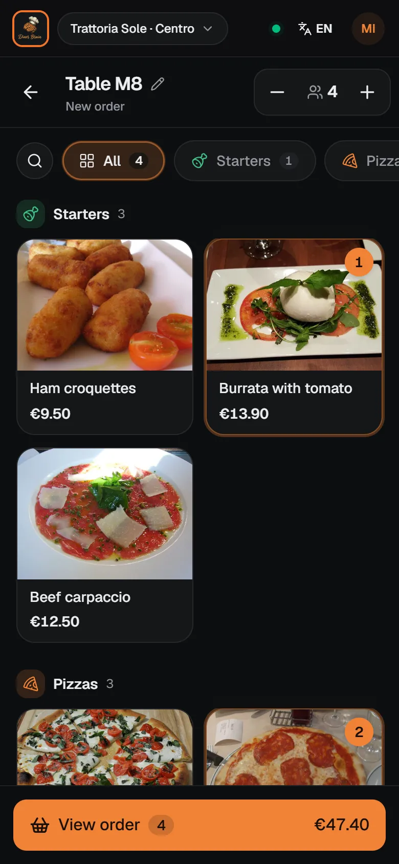Taking the order for table M8 in Diner Brain: menu with photos on the left, the order and its total on the right.